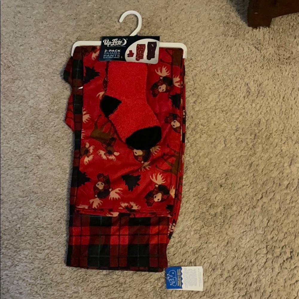 Two pairs of pajama pants with fuzzy socks, XL